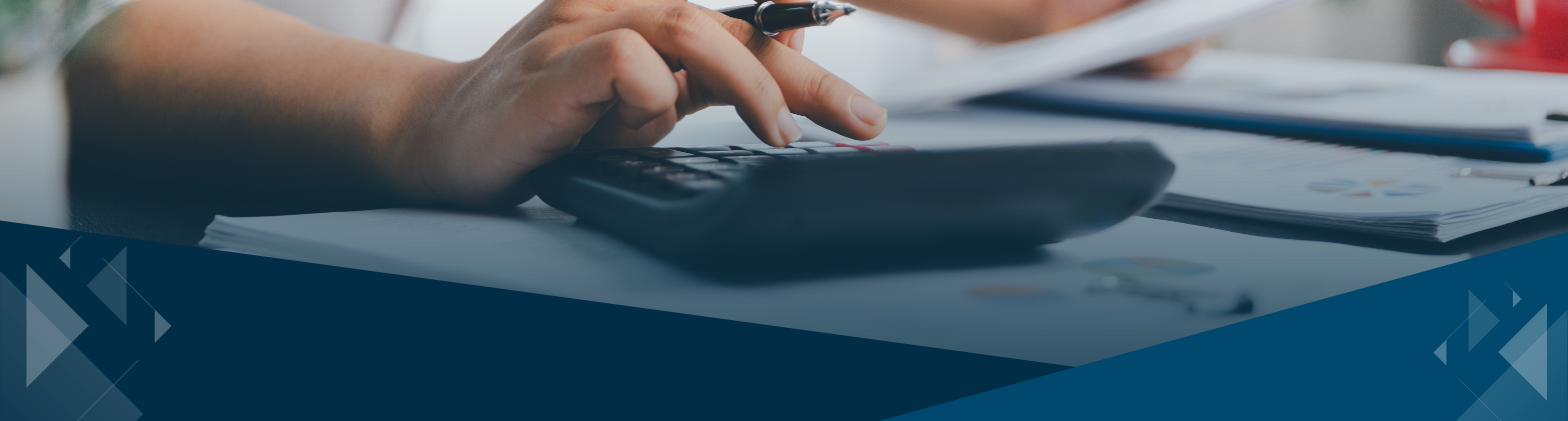 Financial advisor calculating small business savings before year-end